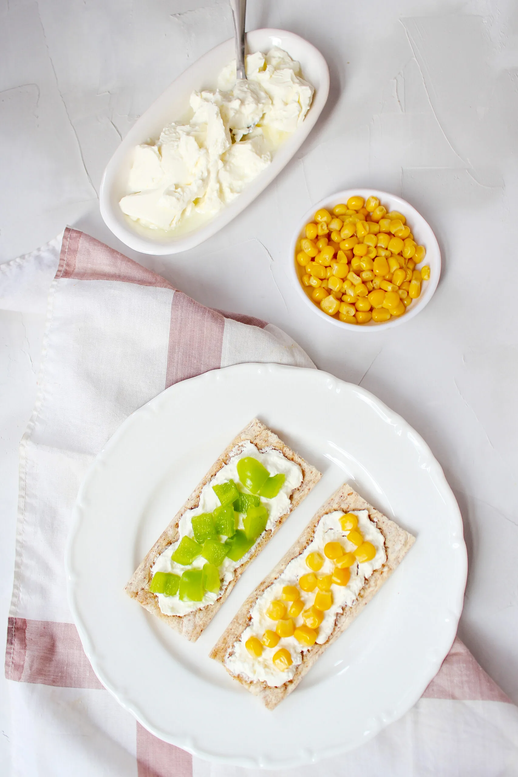 "Smooth and creamy vegan cream cheese spread on a freshly toasted bagel